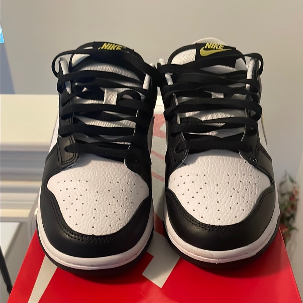 Nike Black and White Sneakers with Yellow Accents